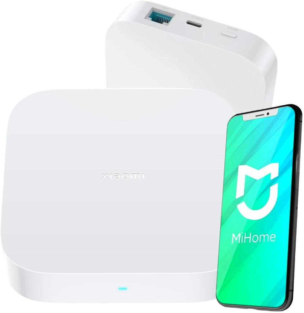 Weißer Xiaomi Smart Home Hub mit Smartphone und MiHome-App auf dem Bildschirm.