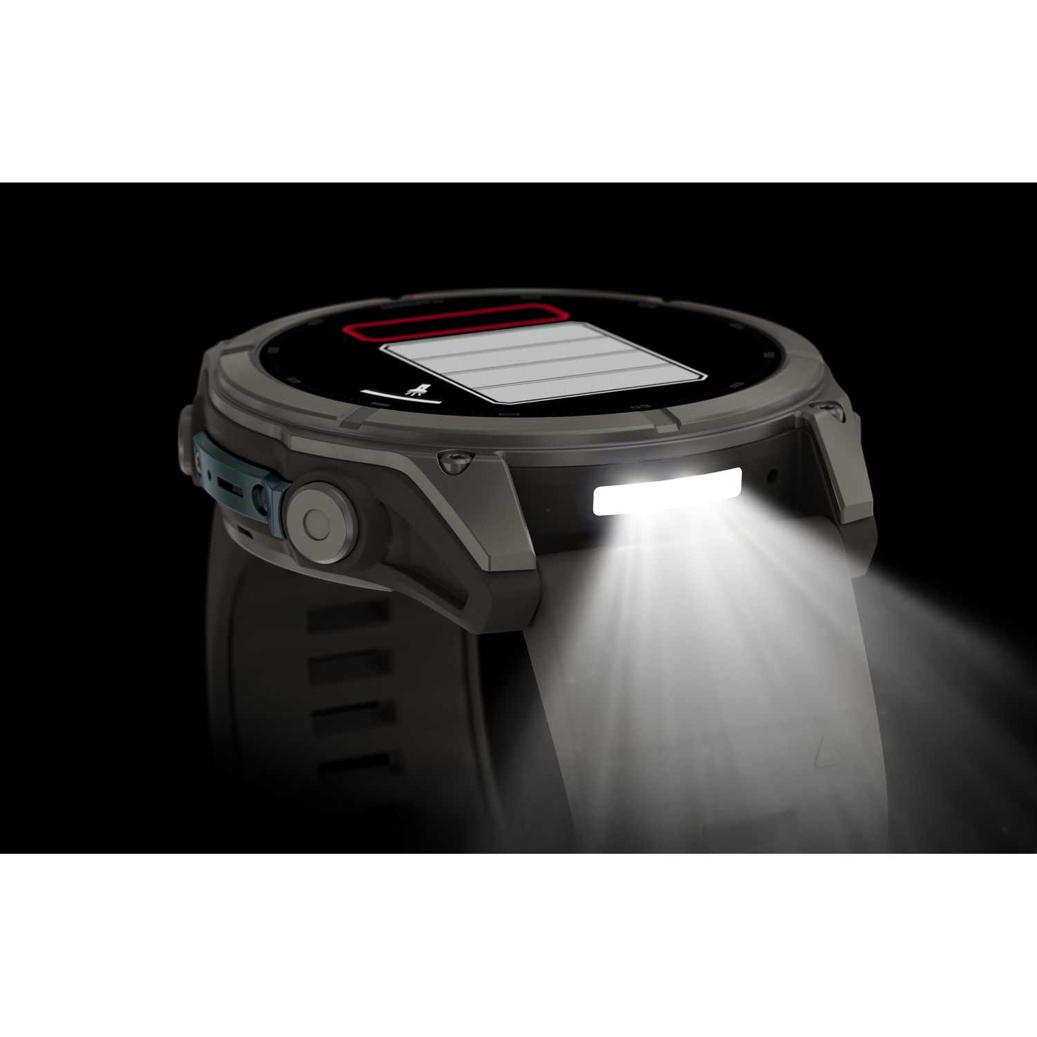 Uno smartwatch con torcia integrata proietta un fascio di luce luminoso verso il basso su sfondo scuro.