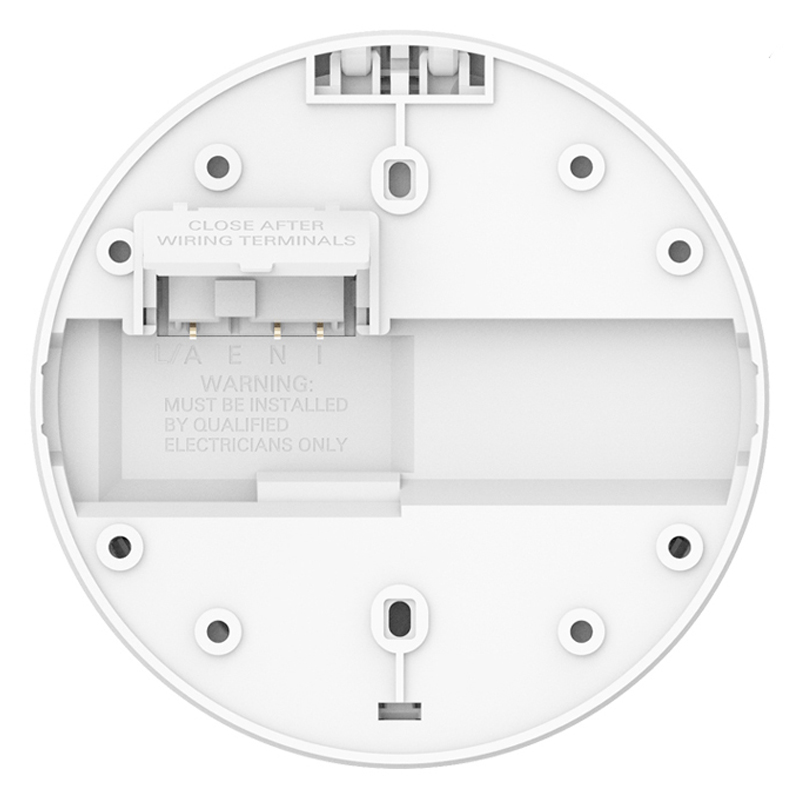 Achterkant van een ronde witte montagebasis met schroefgaten en een open elektrische aansluiting.
