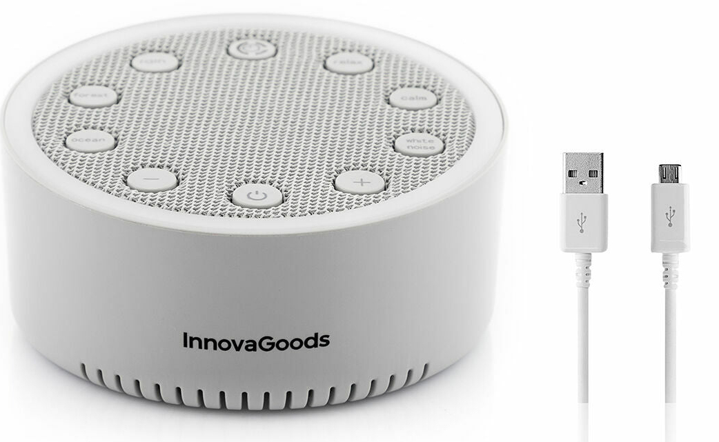 Una máquina de sonido redonda blanca InnovaGoods con botones y un cable USB.