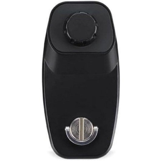 Un dispositivo electrónico negro con una rueda de control arriba y una hebilla metálica redonda abajo.