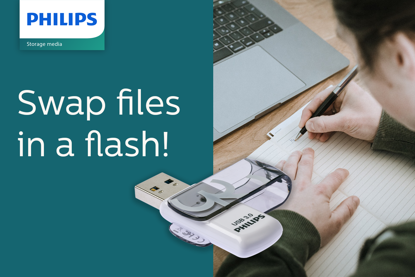 Osoba pisze na papierze obok laptopa, na pierwszym planie pendrive Philips.