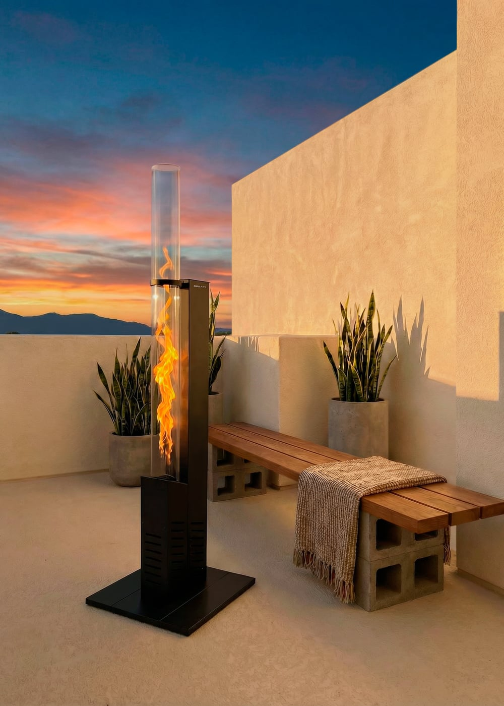 Estufa de patio de pie en una terraza con banco de madera, plantas y cielo al atardecer.
