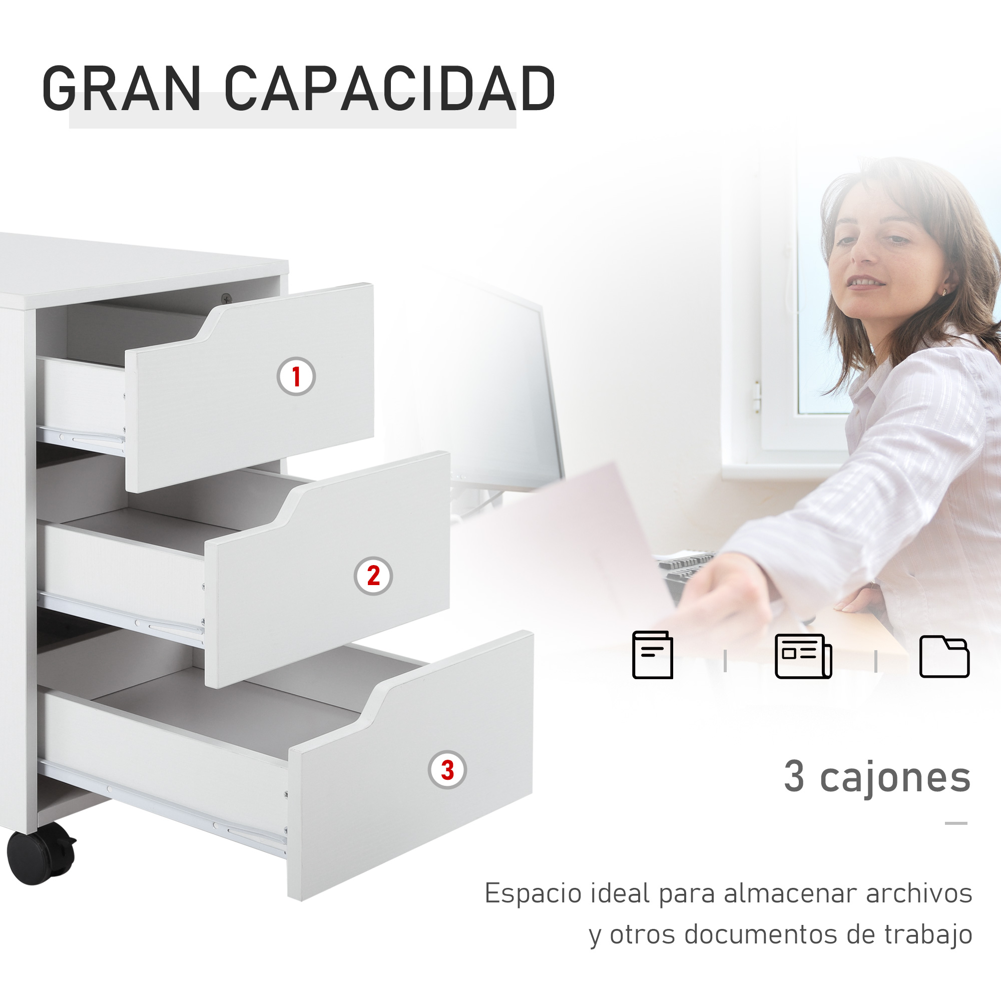 Un mueble con ruedas blanco con tres cajones abiertos y una mujer al fondo.