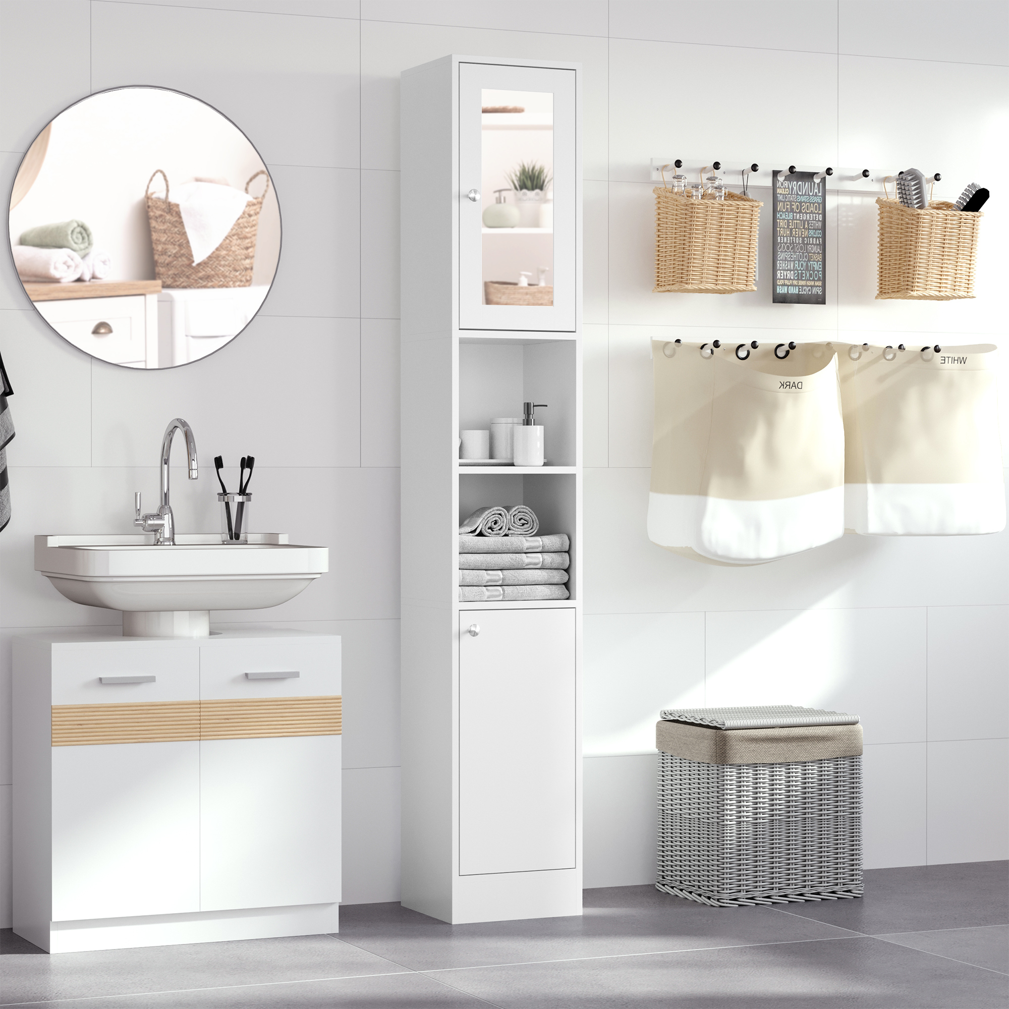 Moderno baño blanco con lavabo, espejo, armario alto y cestos para la colada.