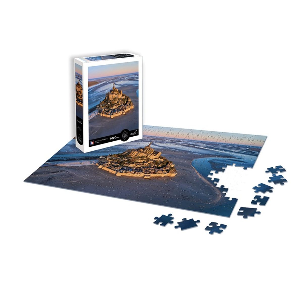 Ein unvollständiges Puzzle von Mont Saint-Michel zeigt die Abtei auf einem Felsen, mit einer Schachtel und Einzelteilen.
