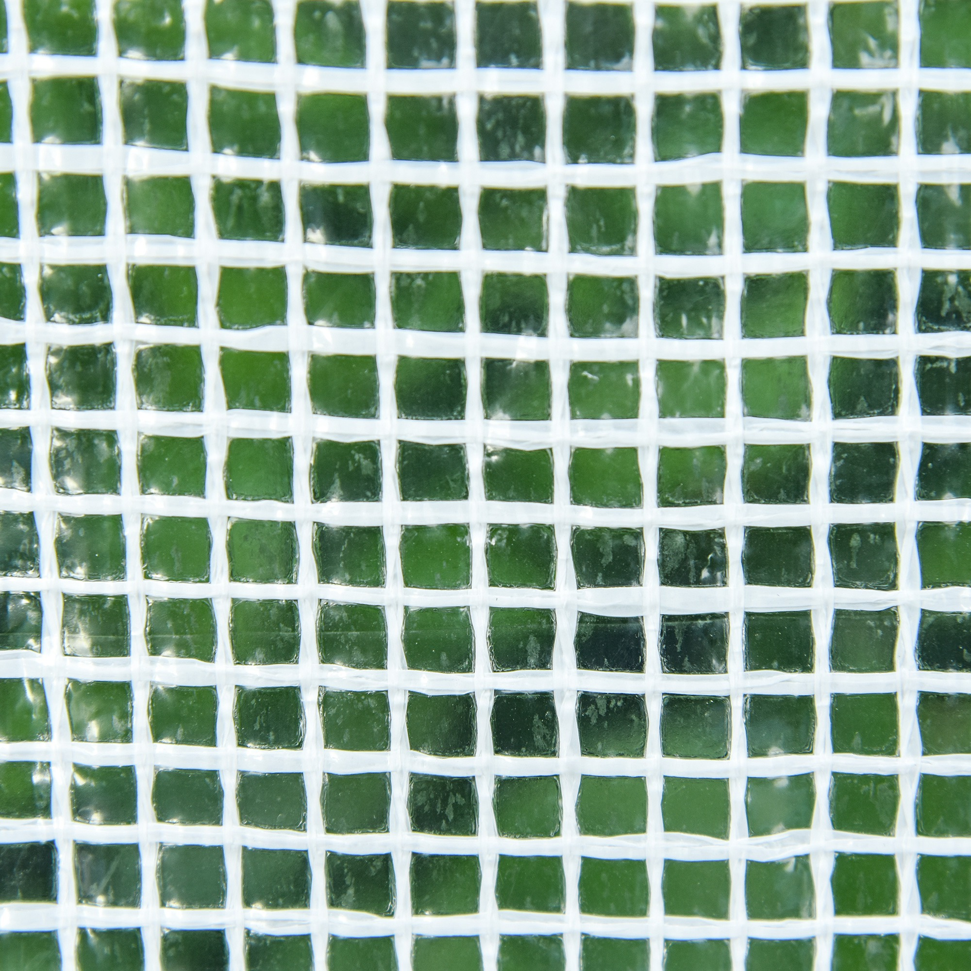 Un patrón de cuadrícula blanca sobre un fondo verde.