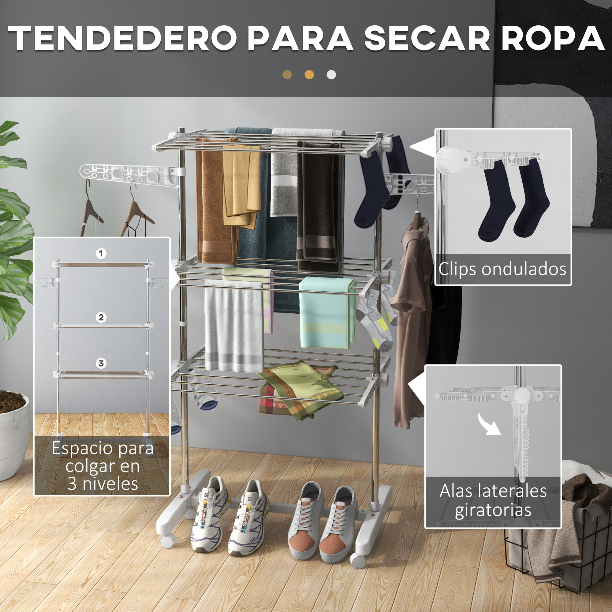 Tendedero de metal de tres niveles con ropa, toallas y zapatos en un suelo de madera.