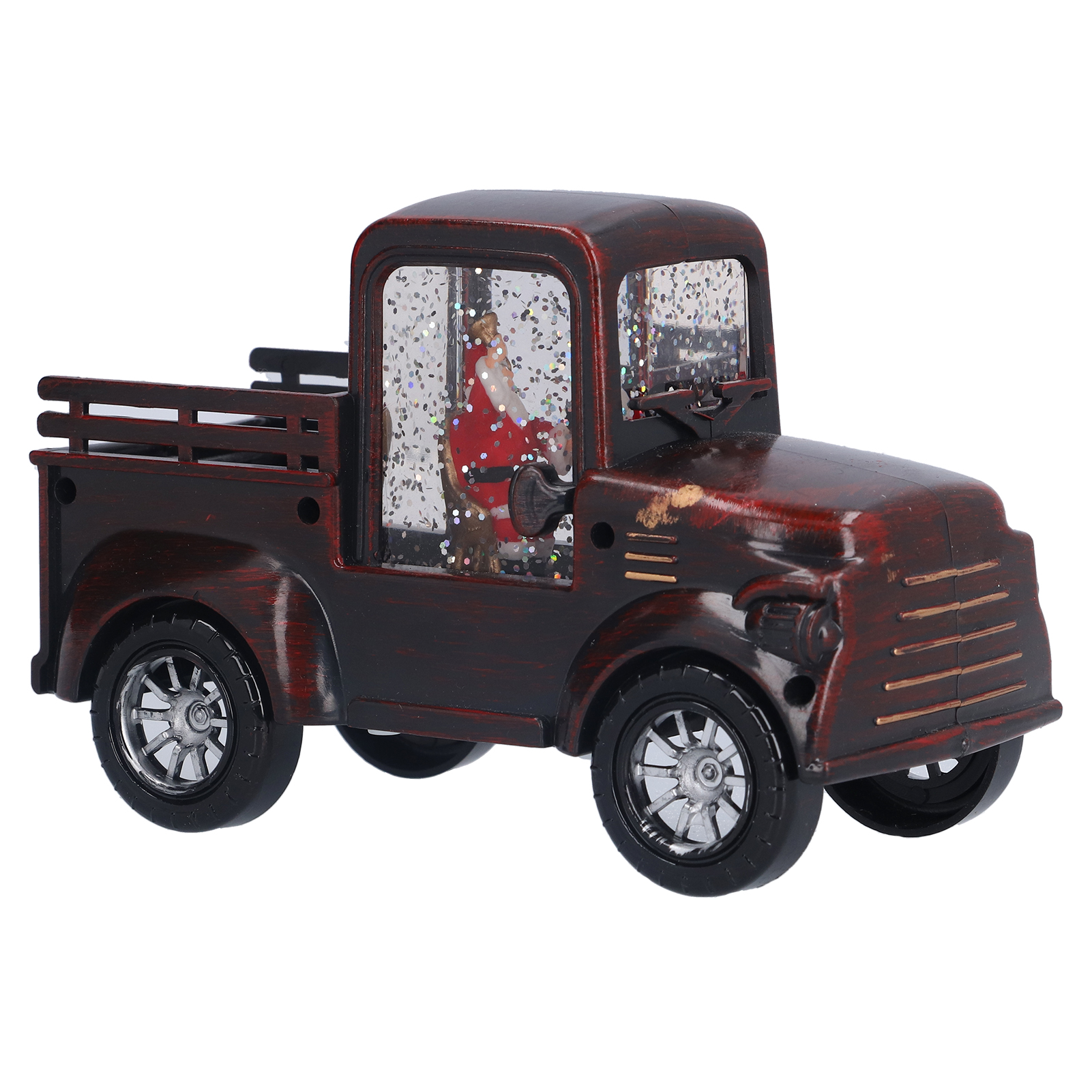Roter, antiker Spielzeug-Weihnachtstruck mit Schneekugel-Führerhaus und Santa drinnen.