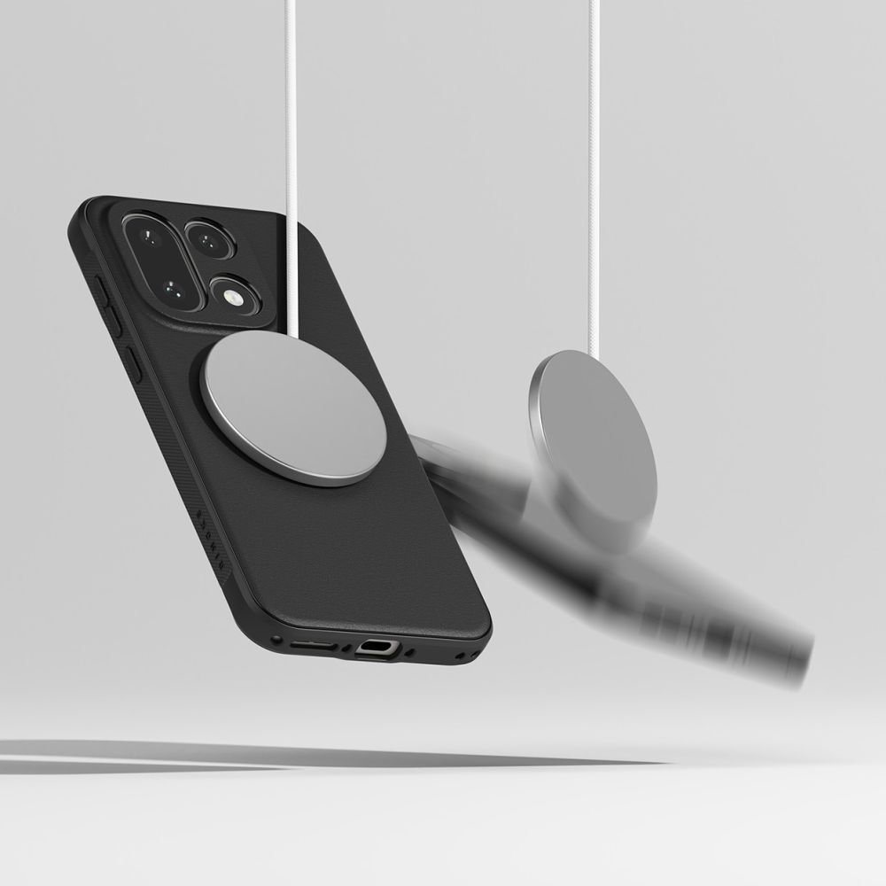 Un telefono nero in una custodia fluttua, attaccato a un cavo bianco con caricatore magnetico, su sfondo grigio.