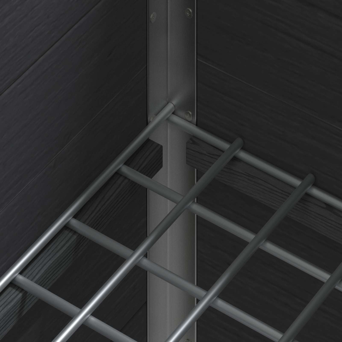 Eckansicht mit grauen Metallgitterregalen und schwarzen Holzvertäfelungen an den Wänden.