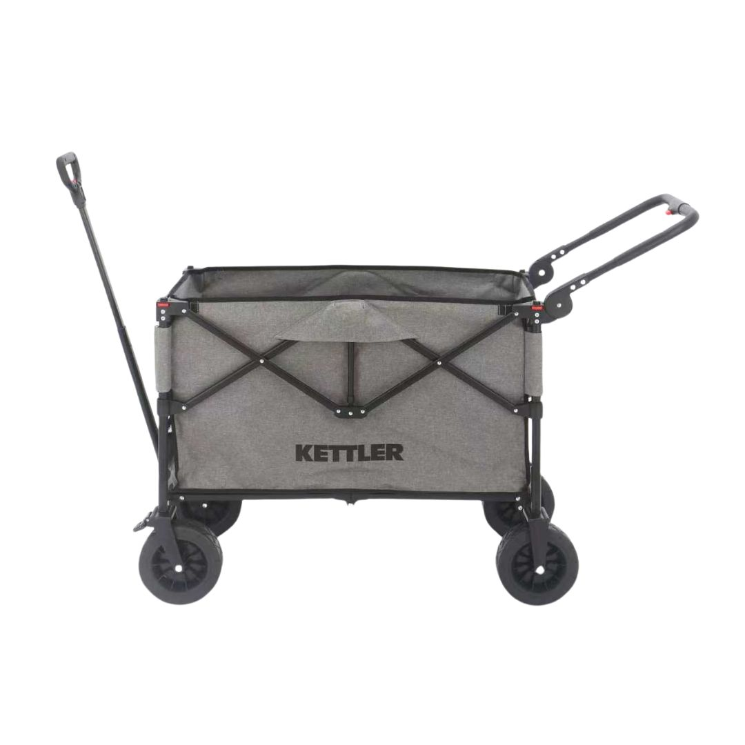 Grauer Kettler Bollerwagen mit schwarzem Metallgestell und vier großen schwarzen Rädern auf weißem Hintergrund.