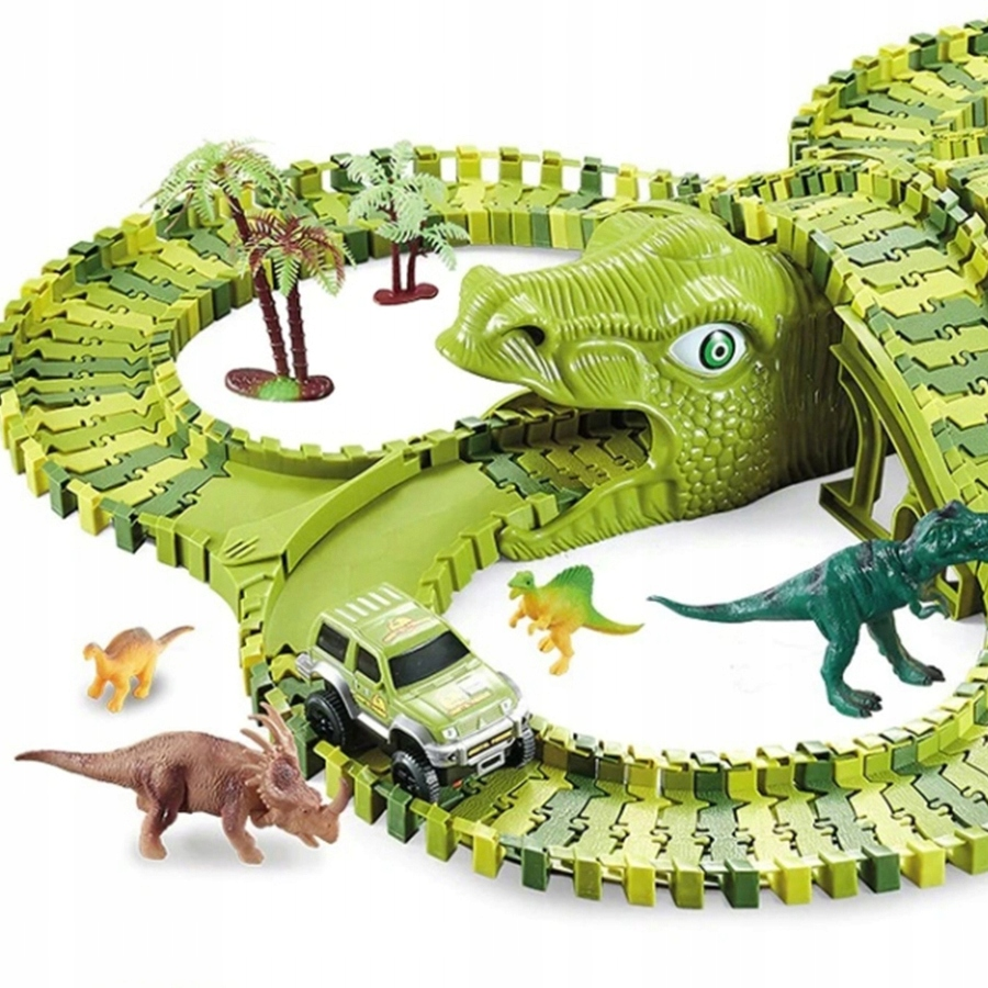 Zestaw toru wyścigowego z zielonym autem, figurkami dinozaurów, drzewkami i tunelem w kształcie głowy dinozaura.