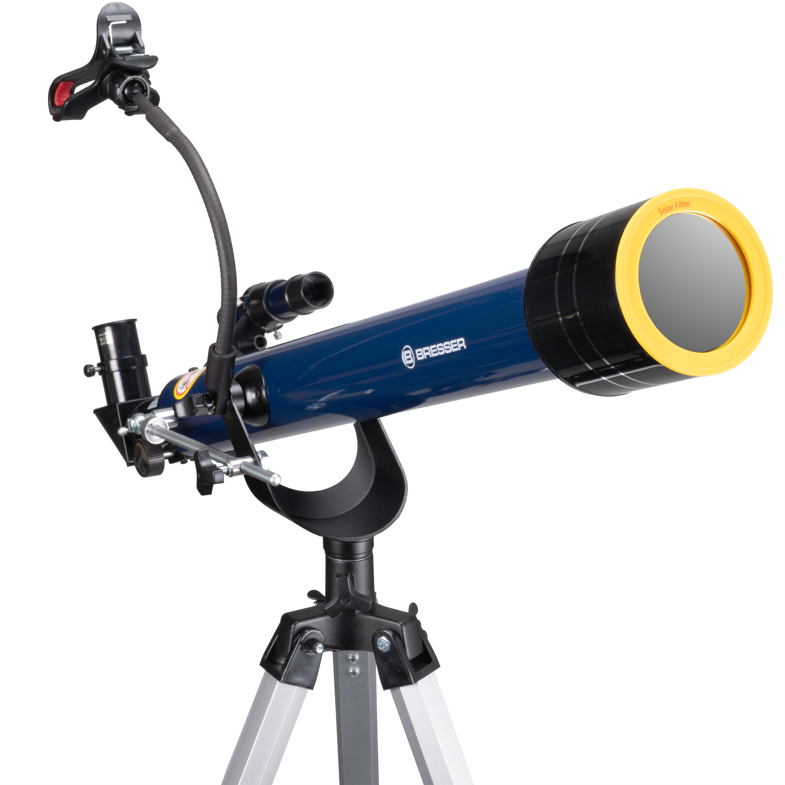 Un telescopio Bresser azul en un trípode con un filtro solar amarillo y soporte para teléfono.