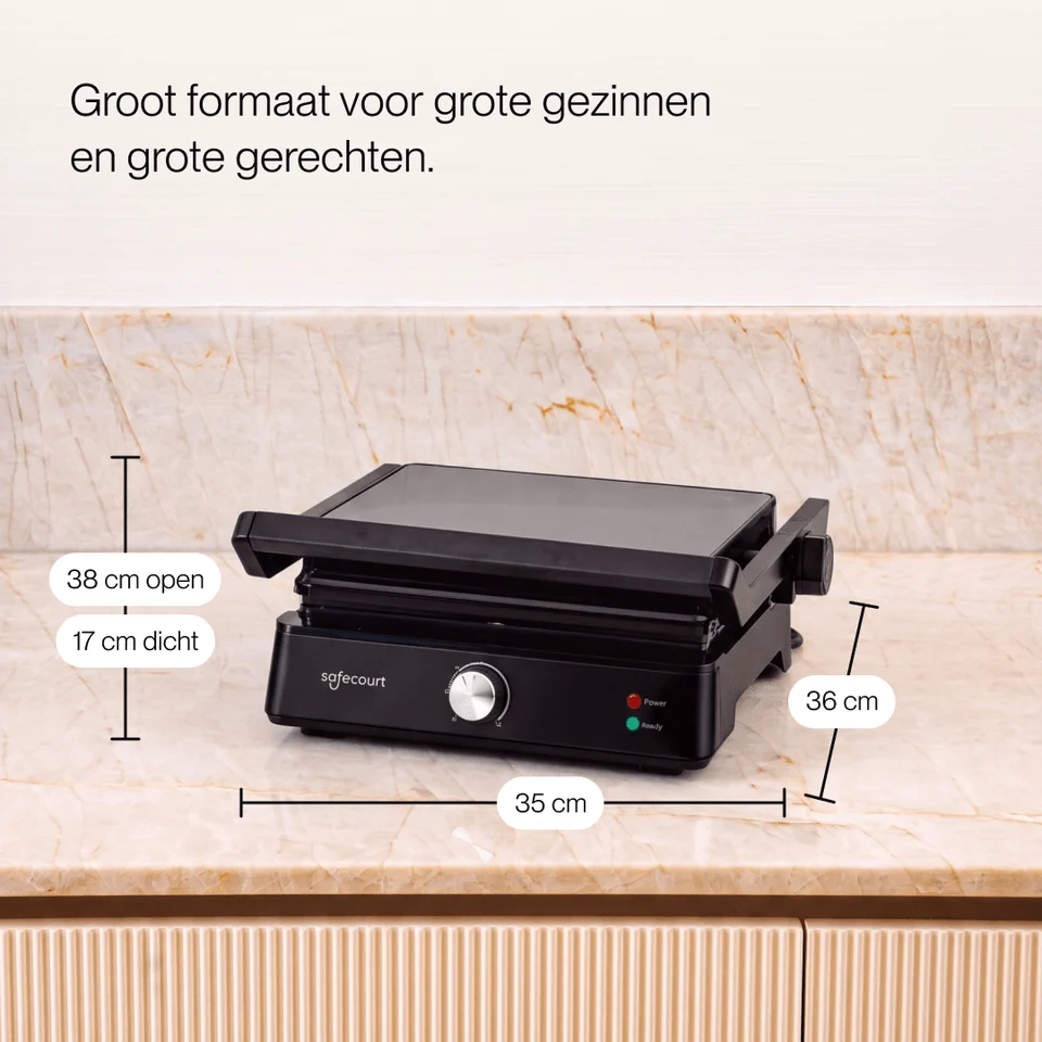 A black Safecourt contact grill stands on a marble countertop with dimension markings.