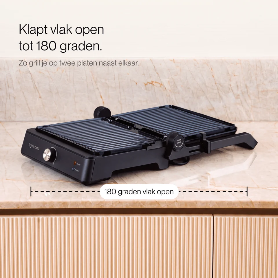 A black electric contact grill opened flat to 180 degrees on a kitchen counter, with Dutch text above.