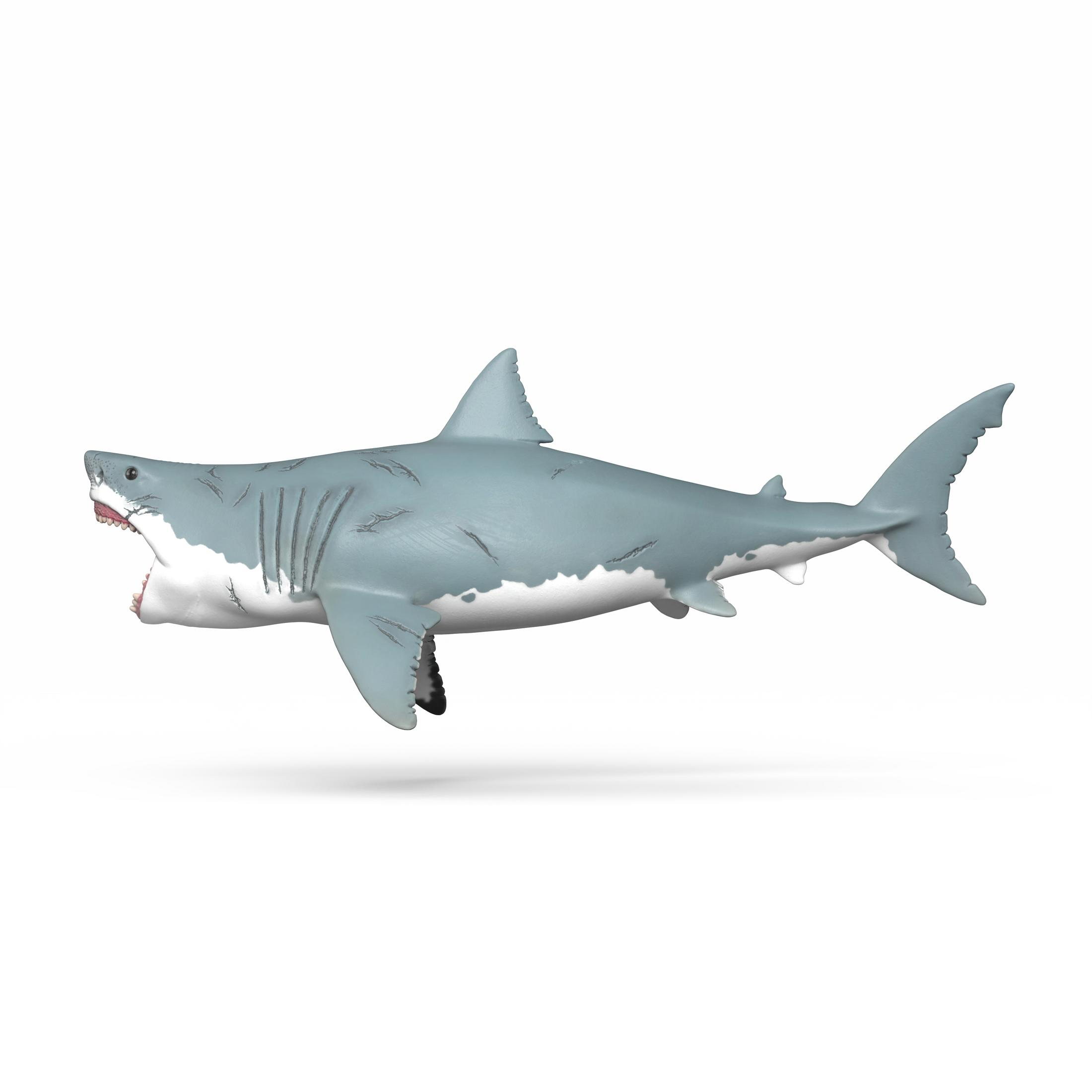 Un requin en plastique gris avec la bouche ouverte et des cicatrices sur un fond blanc.