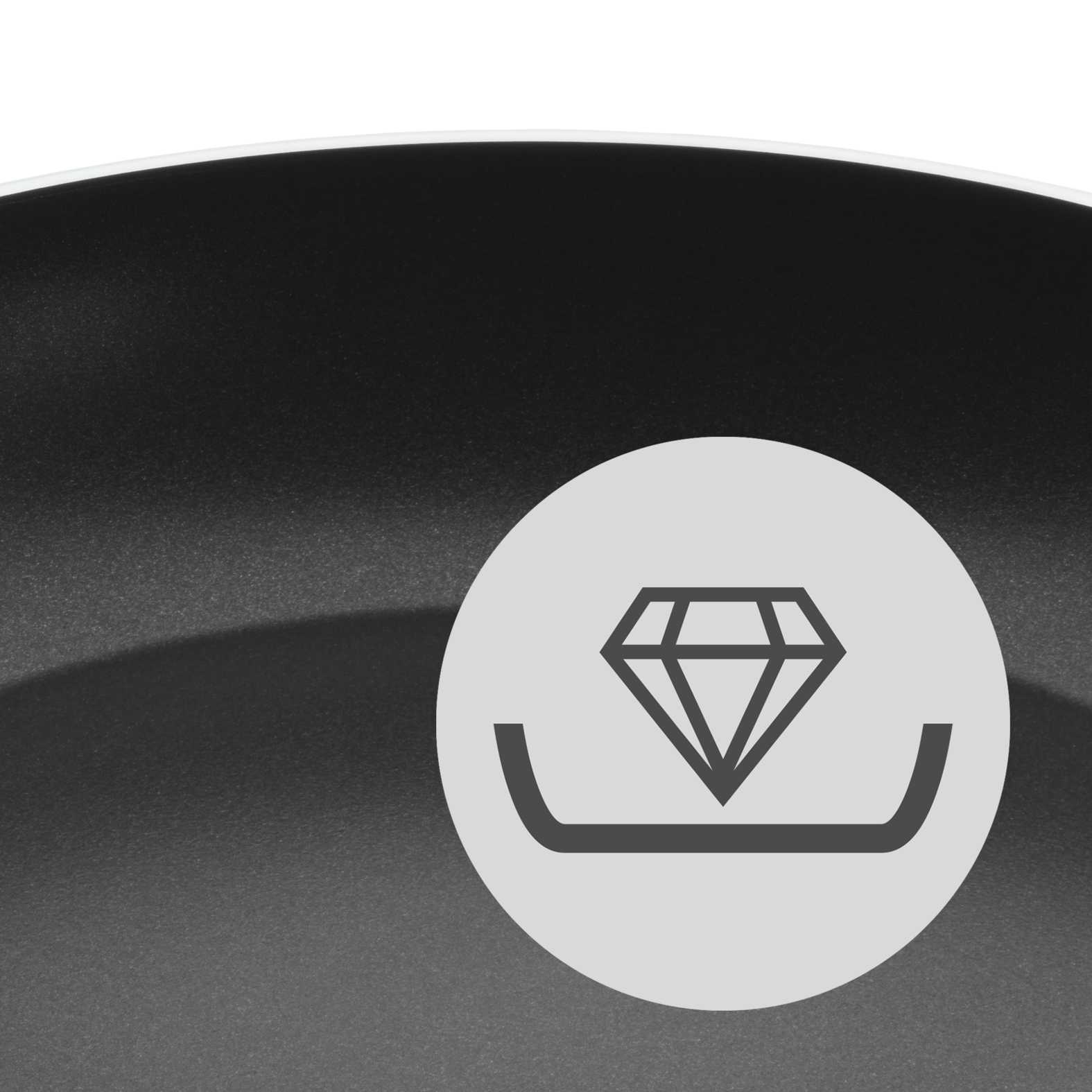 Une poêle noire avec un bord blanc et une icône ronde représentant un diamant.