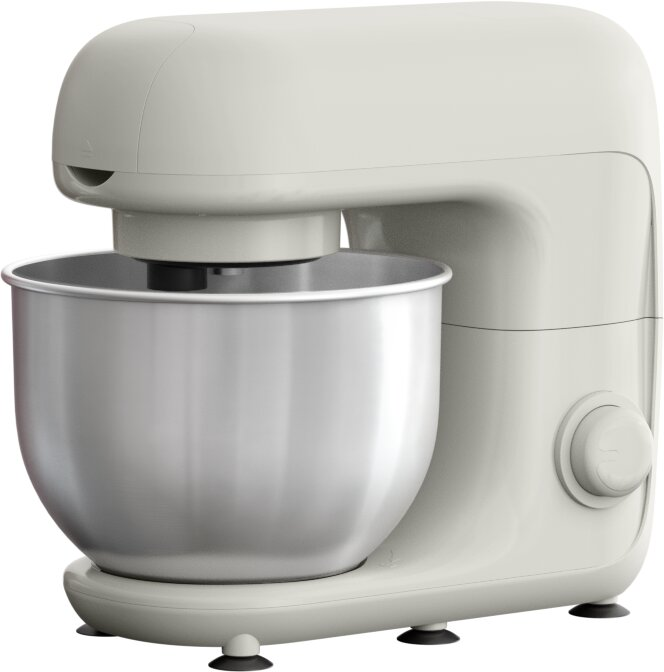 Ein cremefarbener Standmixer mit einer edelstahlenen Schüssel steht auf einer weißen Oberfläche.