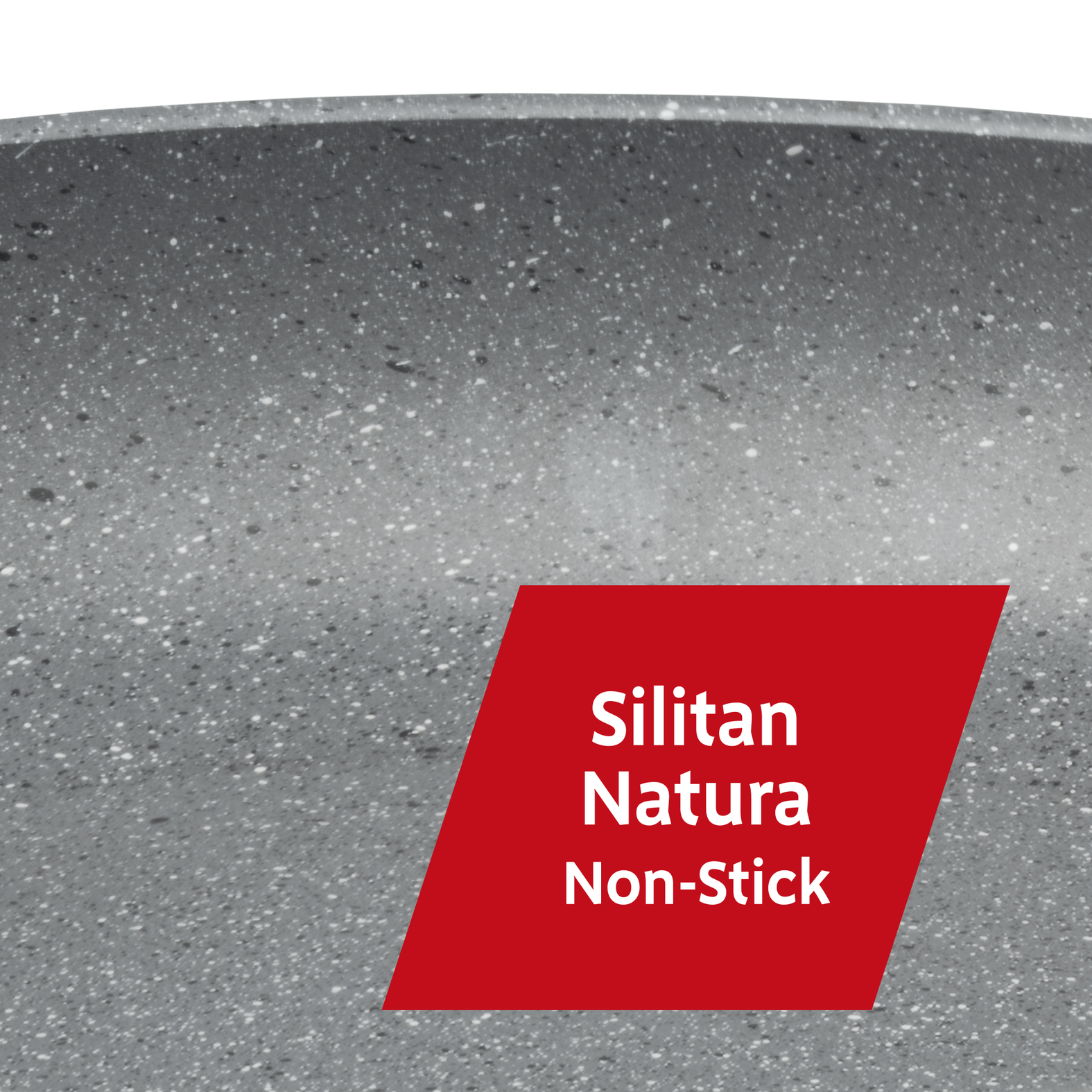 Surface de poêle grise et mouchetée avec une étiquette rouge "Silitan Natura Non-Stick".