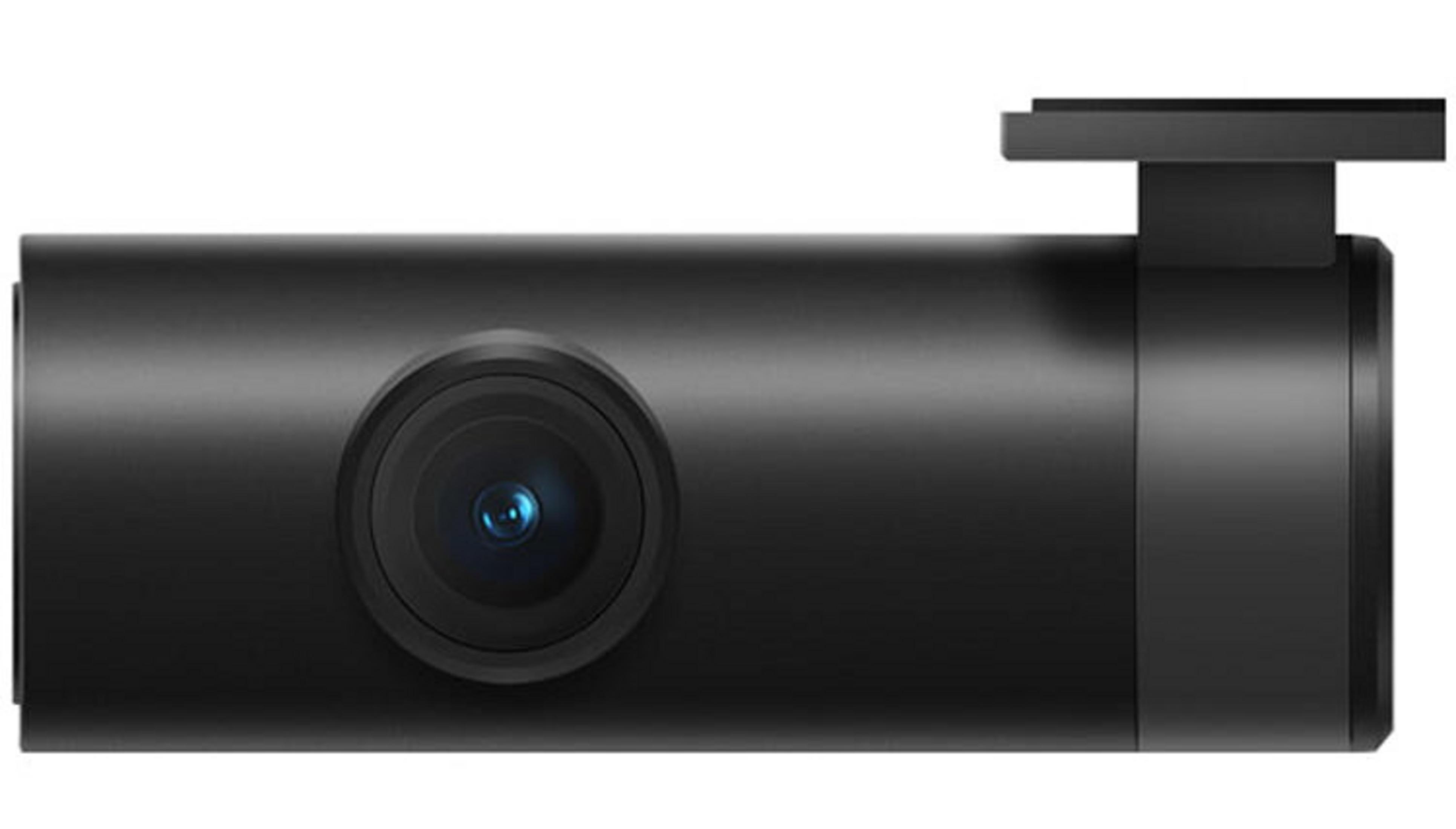 Schwarze Dashcam im Querformat mit einem zentralen Objektiv und einer Halterung oben auf einer hellen Fläche.