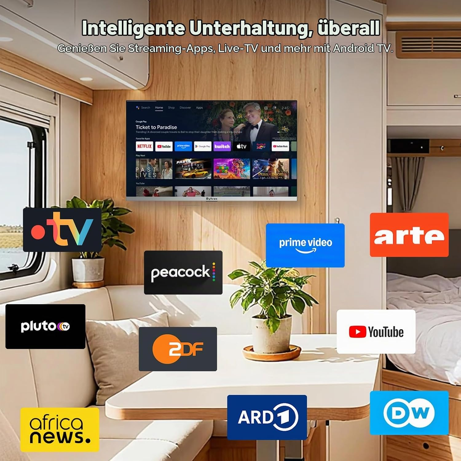 Interior de autocaravana con una pantalla de TV que muestra Android TV y varios logotipos de streaming.