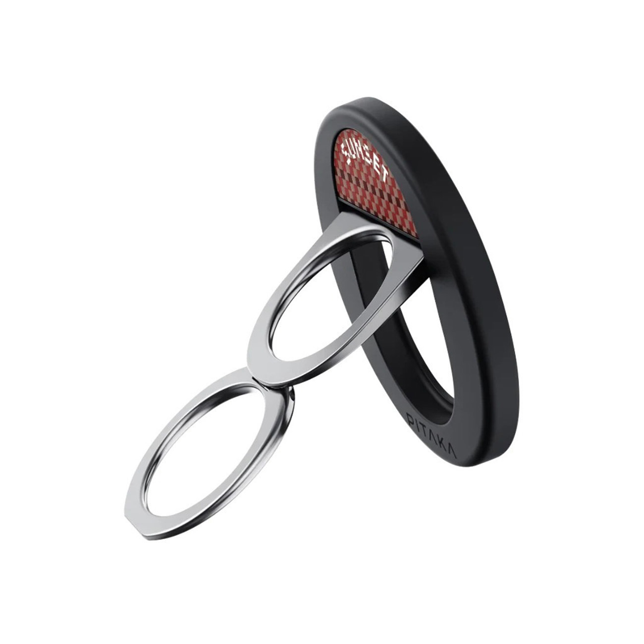 Soporte de anillo Pitaka negro con dos anillos metálicos plateados interconectados y un detalle a cuadros rojo sobre fondo blanco.