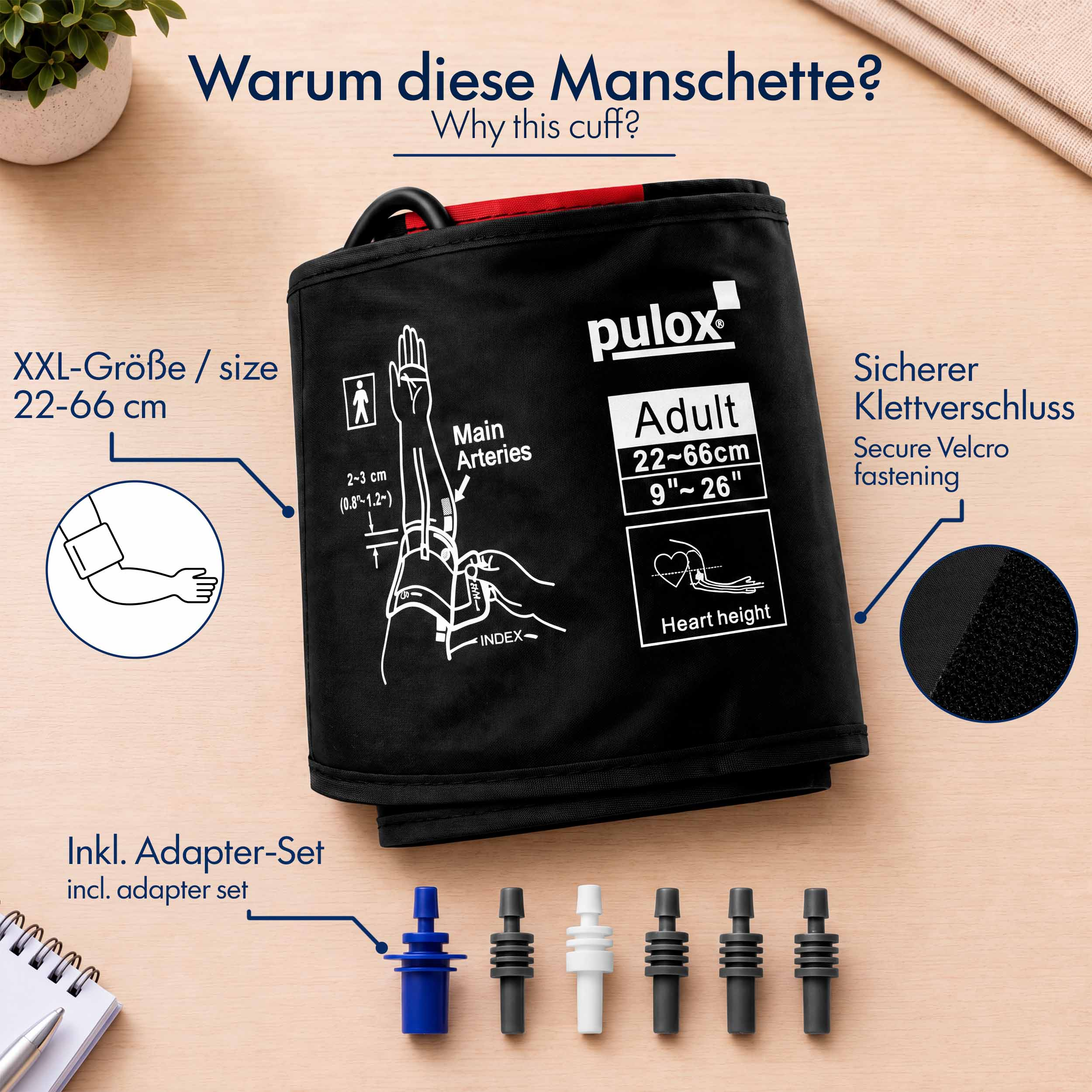 Eine schwarze Blutdruckmanschette mit Diagrammen, Text und Adapterset auf Holztisch.