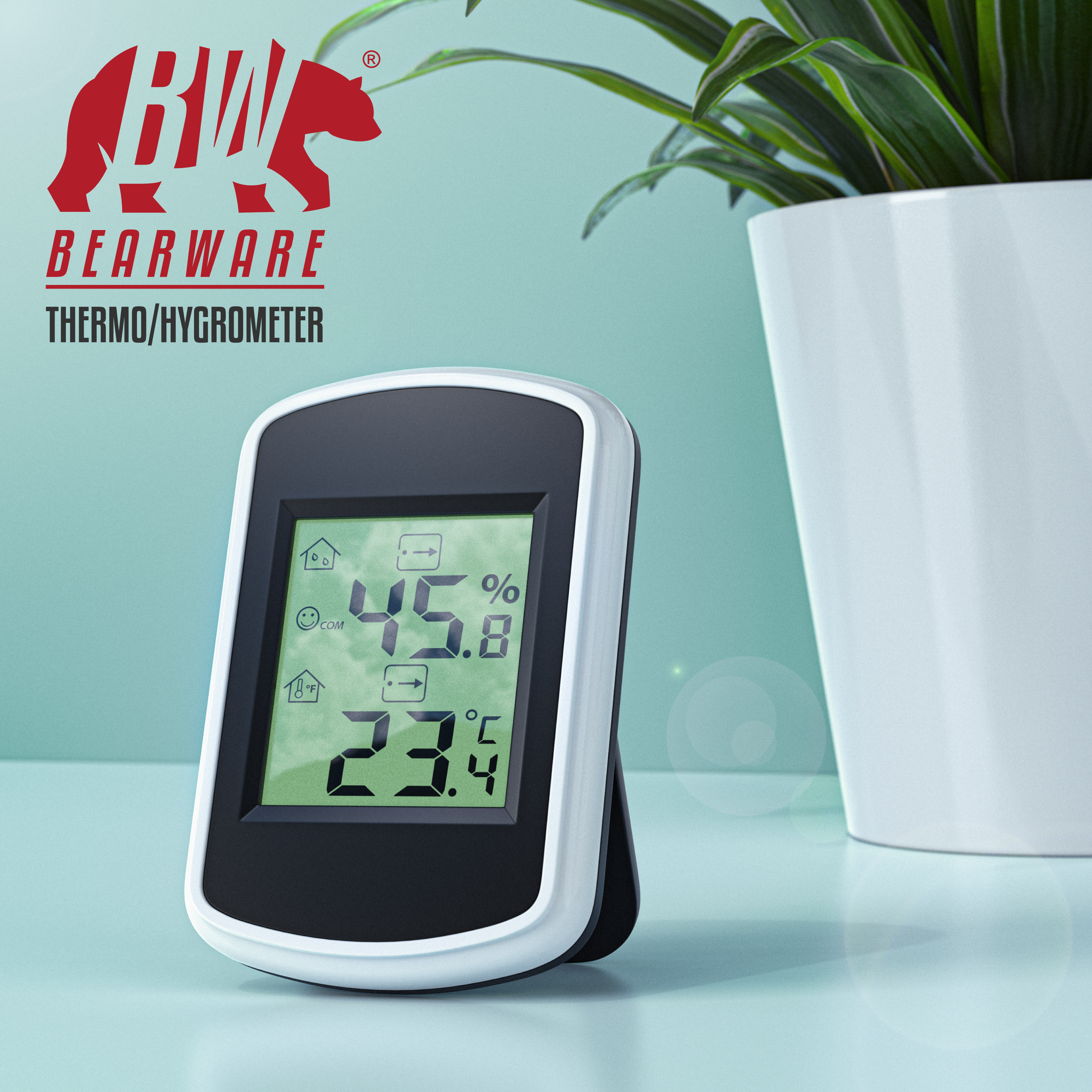 Ein digitaler Thermo-Hygrometer auf einer hellblauen Oberfläche, neben einem weißen Blumentopf mit grünen Pflanzen.