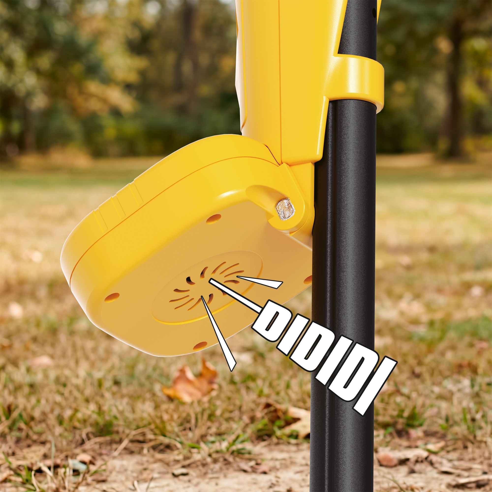 Un dispositivo amarillo en un poste negro al aire libre con el texto DIDIDI.
