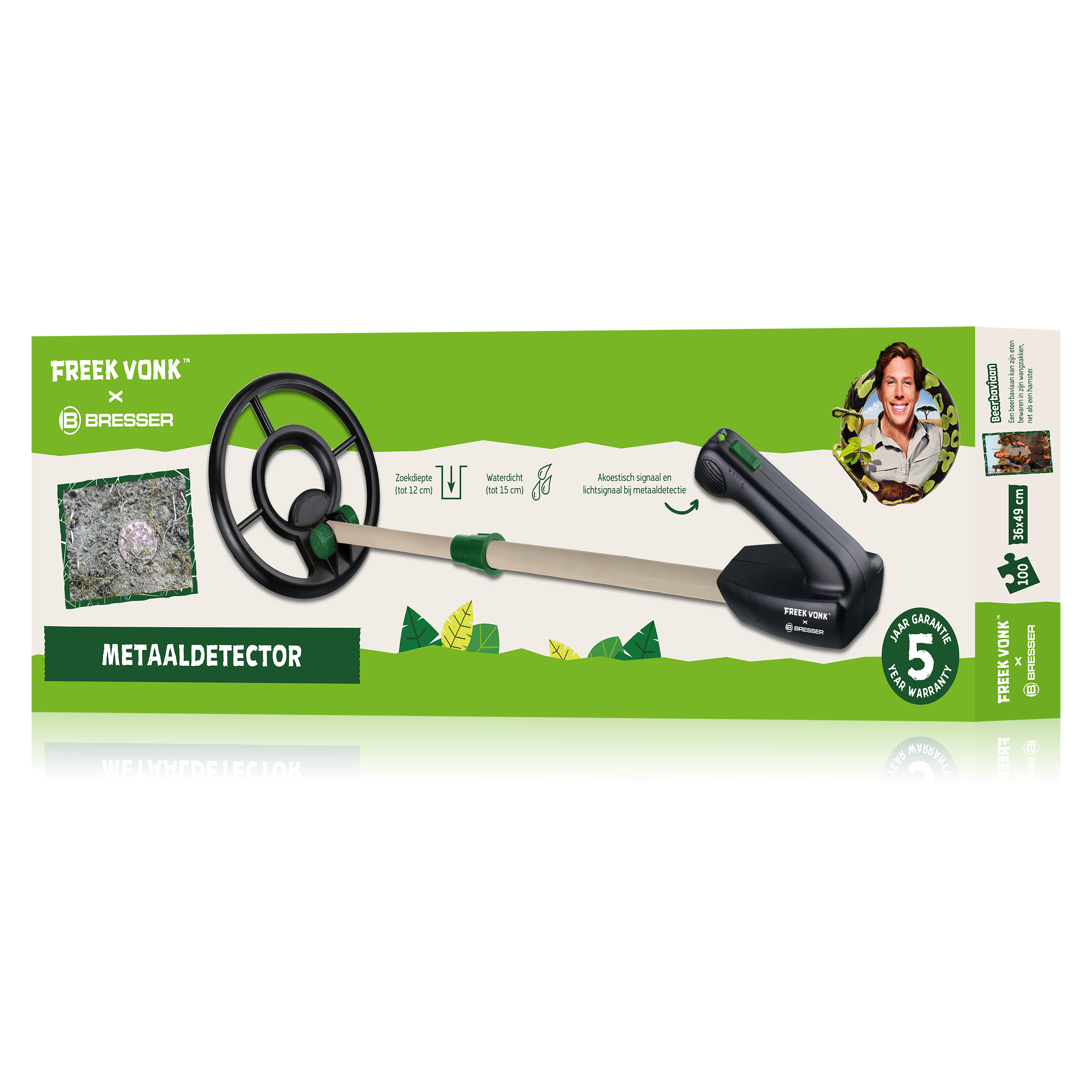 Caja de producto verde para un detector de metales Freek Vonk x Bresser con una imagen del dispositivo y un hombre.