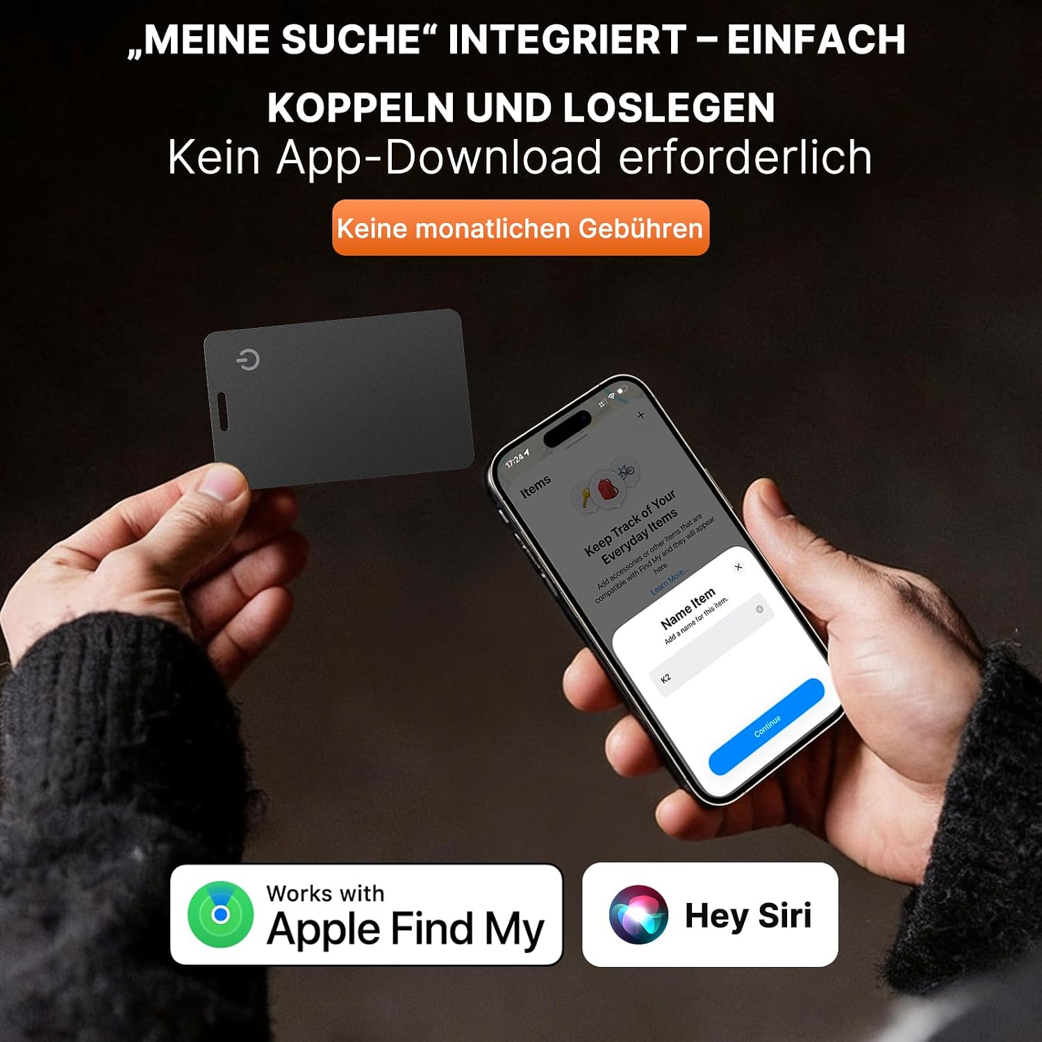 Person hält schwarze Suchkarte und Smartphone mit Find My App.