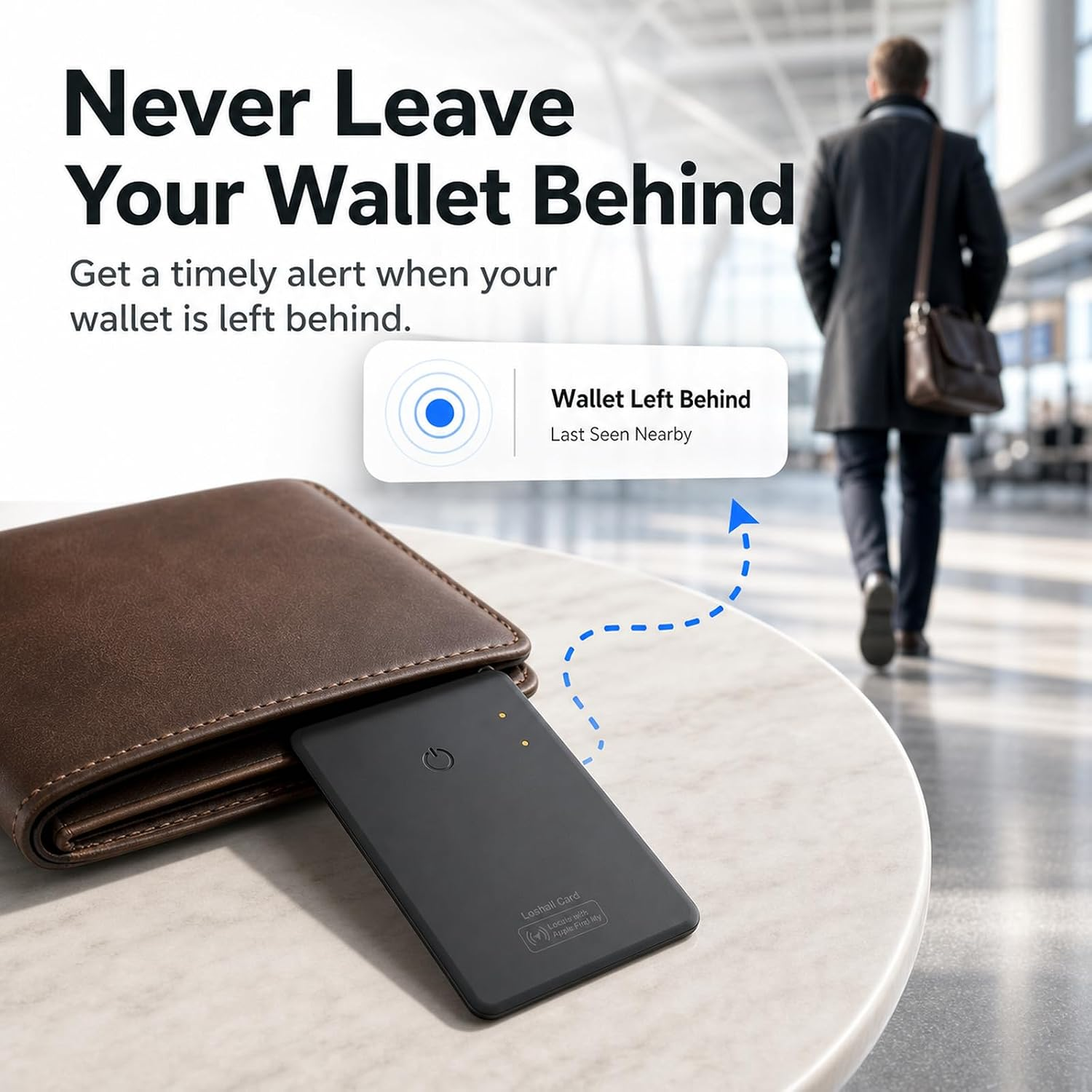 Ein schwarzer Tracker liegt neben einem braunen Geldbeutel auf einem Tisch in einem Bahnhof.