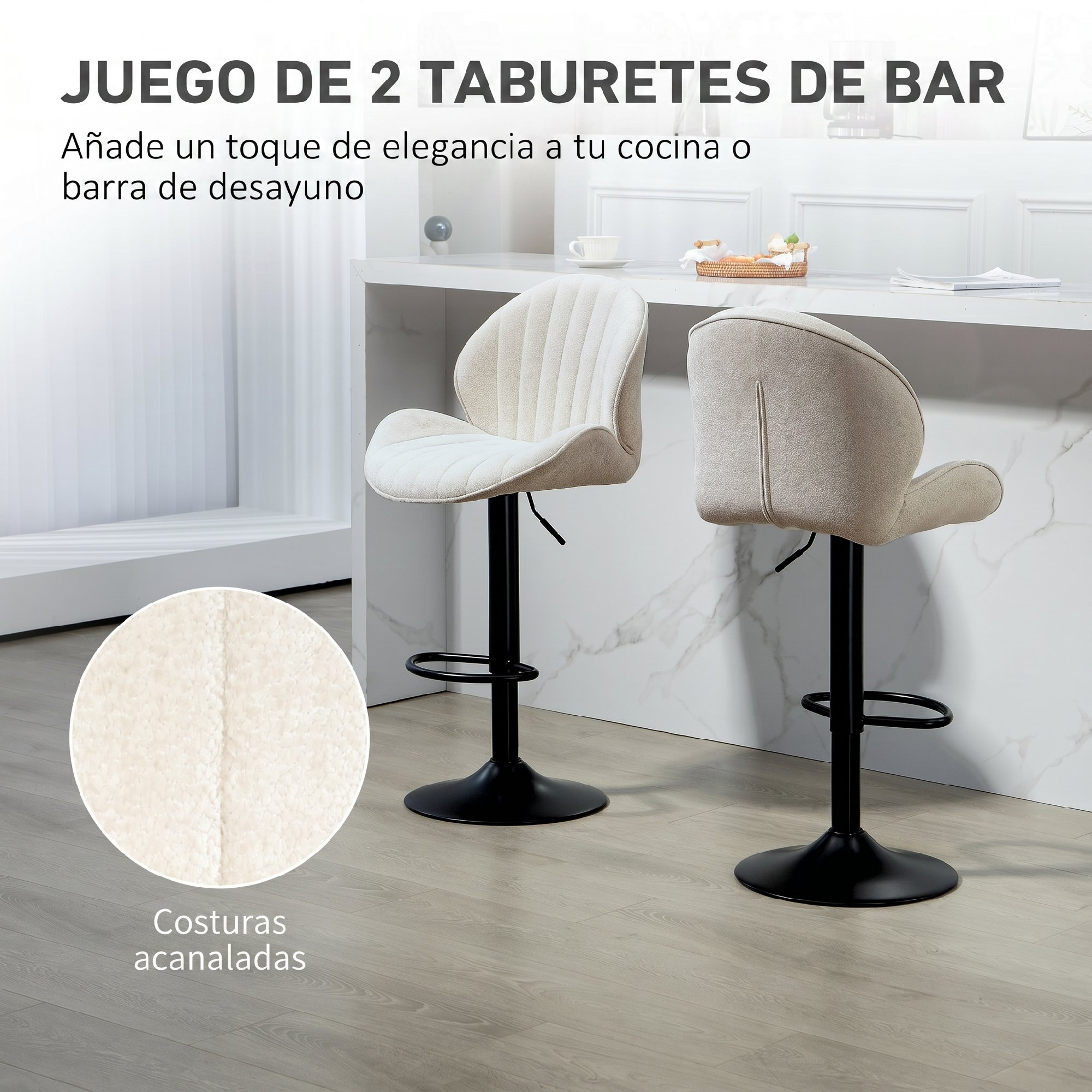 Dos taburetes de bar blancos con bases de metal negro en una cocina luminosa.