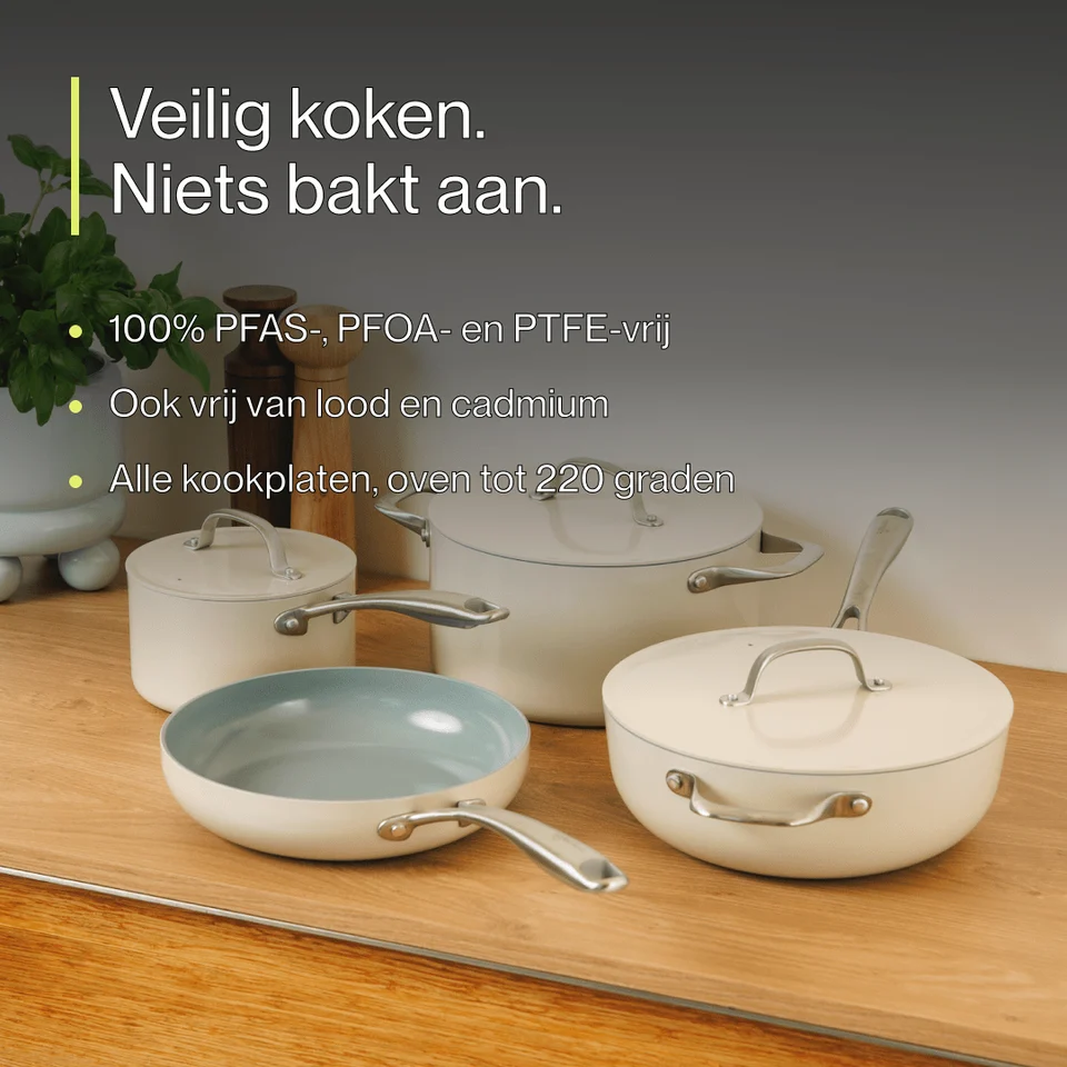 A set of cream-colored cookware with stainless steel handles on a wooden counter, alongside promotional Dutch text.