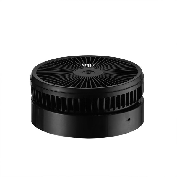 Un ventilador de mesa redondo y negro con rejilla protectora sobre fondo blanco.
