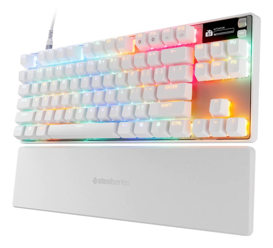 Un teclado mecánico blanco con retroiluminación RGB y un reposamuñecas a juego.