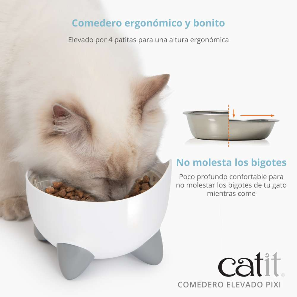 Un comedero blanco para gatos con patas grises lleno de pienso, mientras un gato come de él.