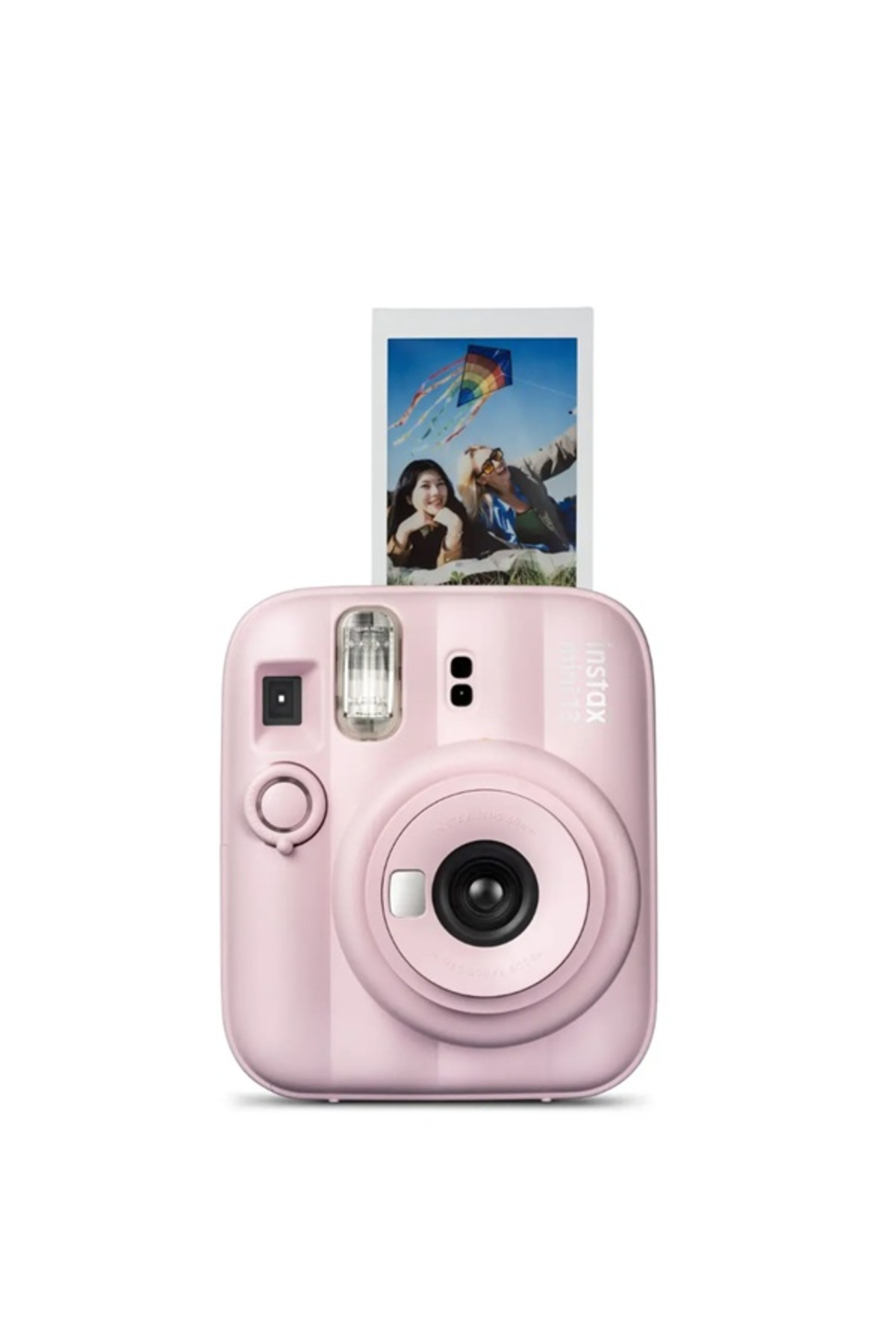 Üstünden iki gülen insan ve bir uçurtma fotoğrafı çıkan pembe bir anlık kamera.