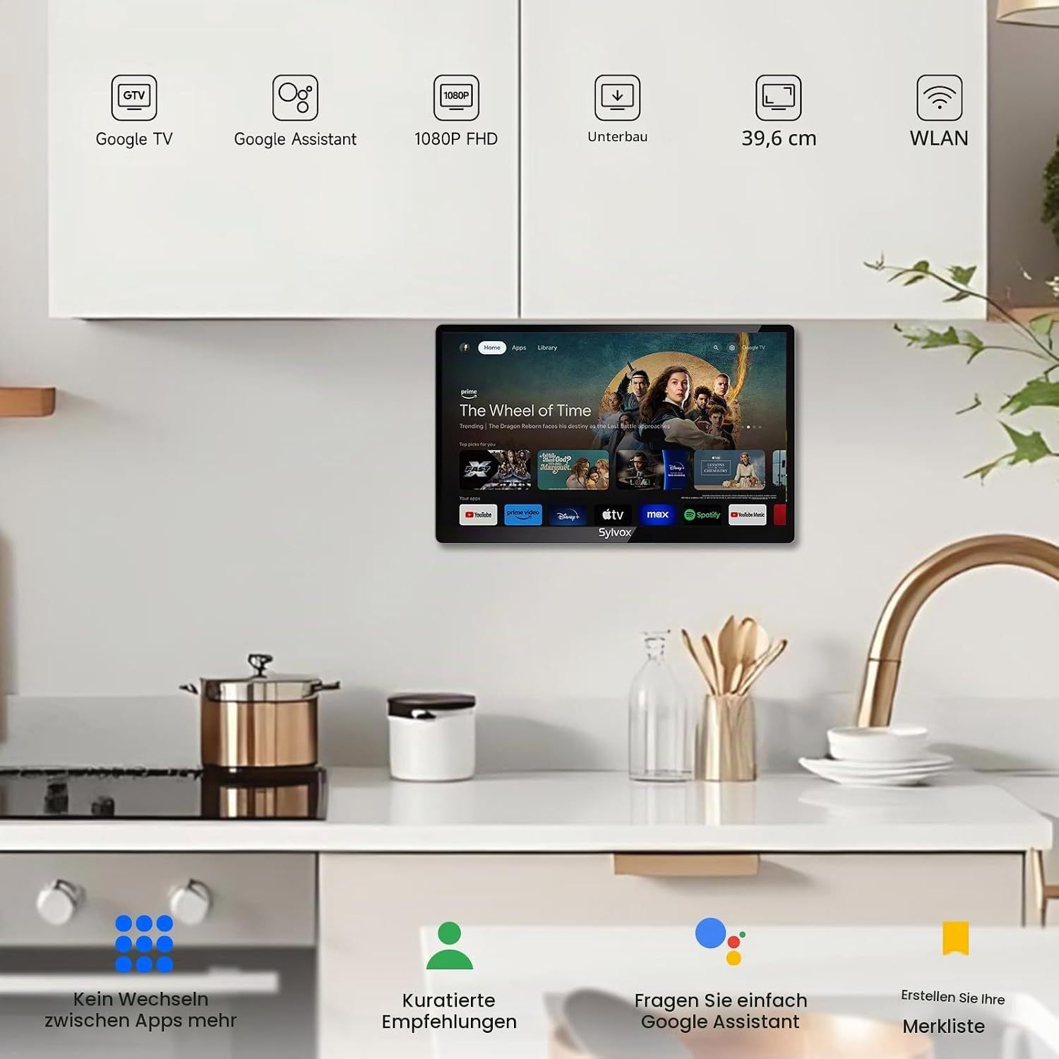 Una cocina con gabinetes blancos, una pantalla inteligente con Prime Video y una olla en la encimera.
