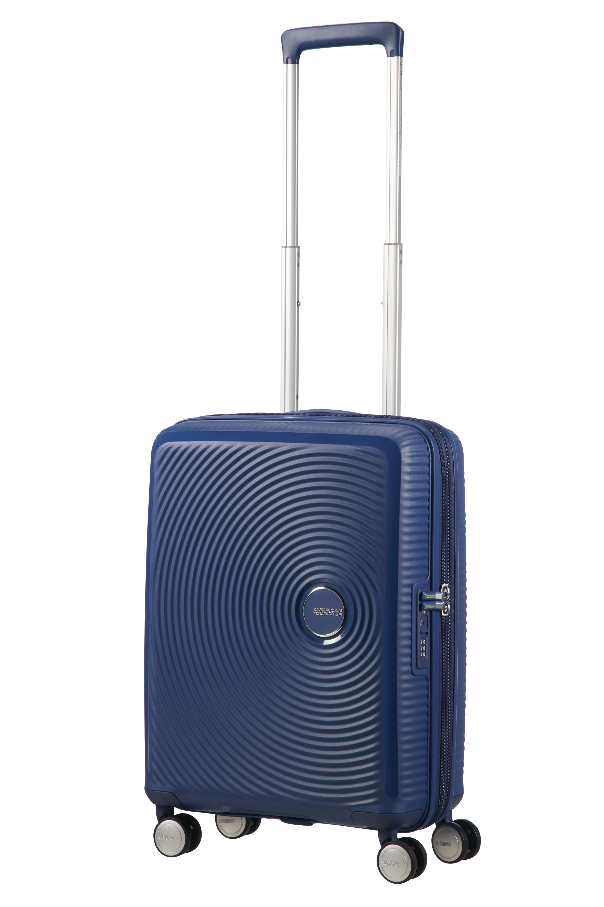 Niebieska twarda walizka American Tourister z wysuwaną rączką i czterema kółkami na białym tle.