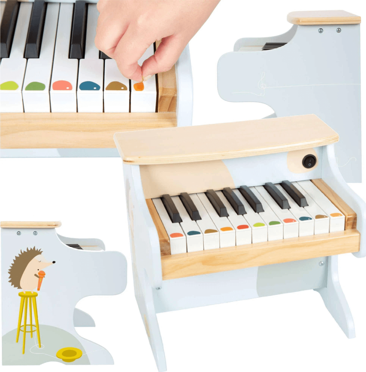 Un pequeño piano de juguete de madera blanca con teclas coloridas y un erizo cantando.