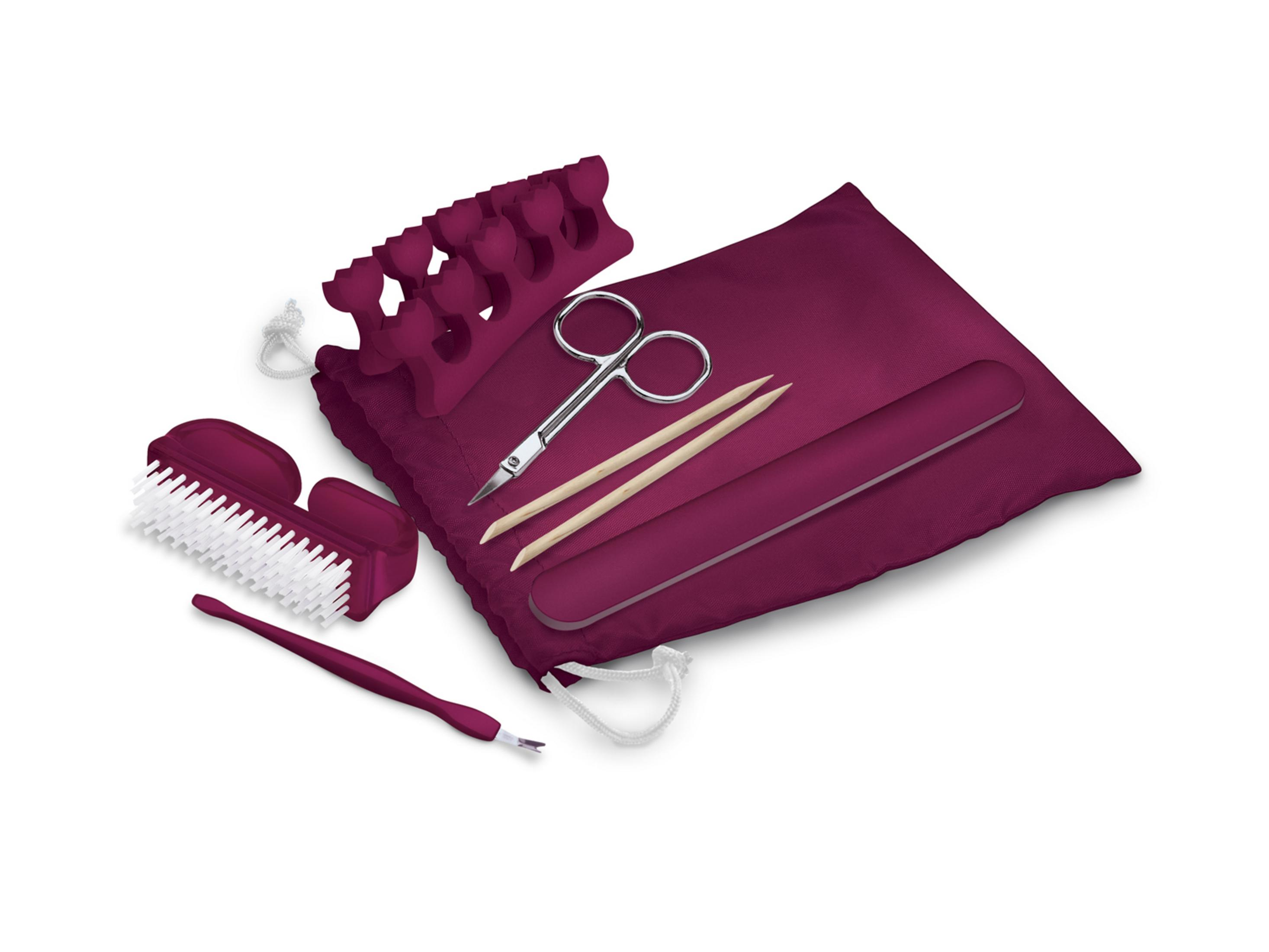 Ein burgunderrotes Maniküre-Set mit Tasche, Schere, Nagelfeile, Bürste, Zehentrennern und Holstäbchen.