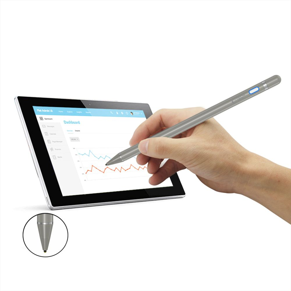 Una mano tiene una penna stilo argentata e la usa su un tablet che mostra grafici.