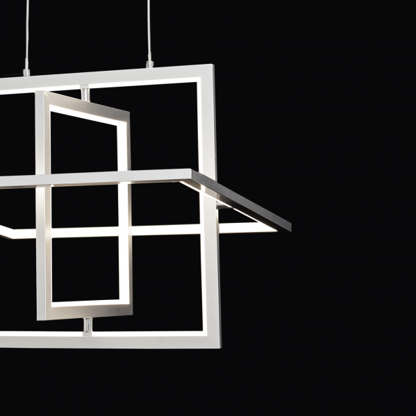 Lámpara colgante geométrica moderna con iluminación blanca sobre fondo negro.