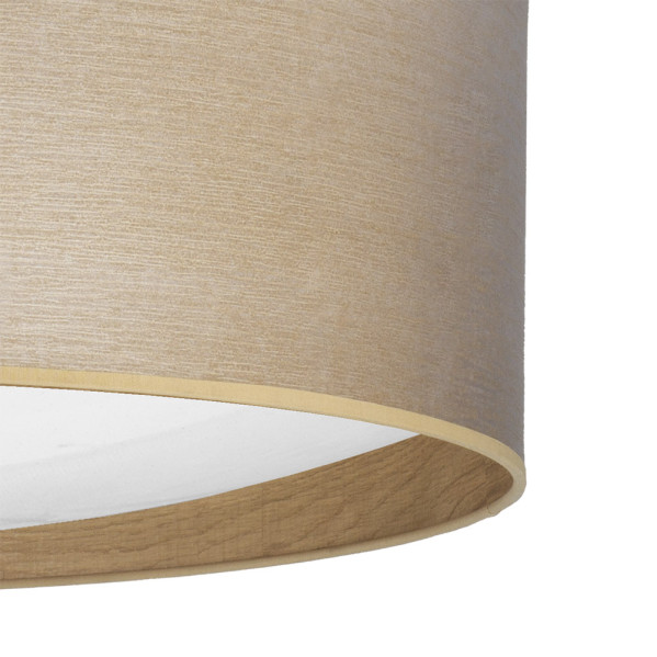 Una pantalla de lámpara cilíndrica con tela beige texturizada y un interior blanco.