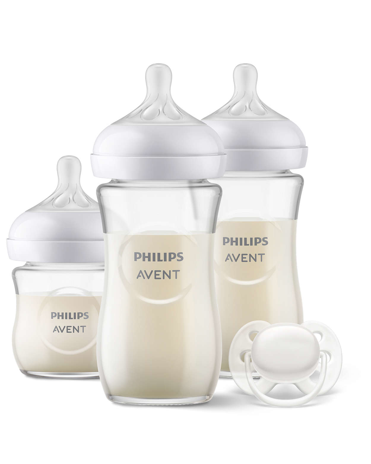 Drei Philips Avent Babyflaschen mit Milch und ein weißer Schnuller auf weißem Hintergrund.