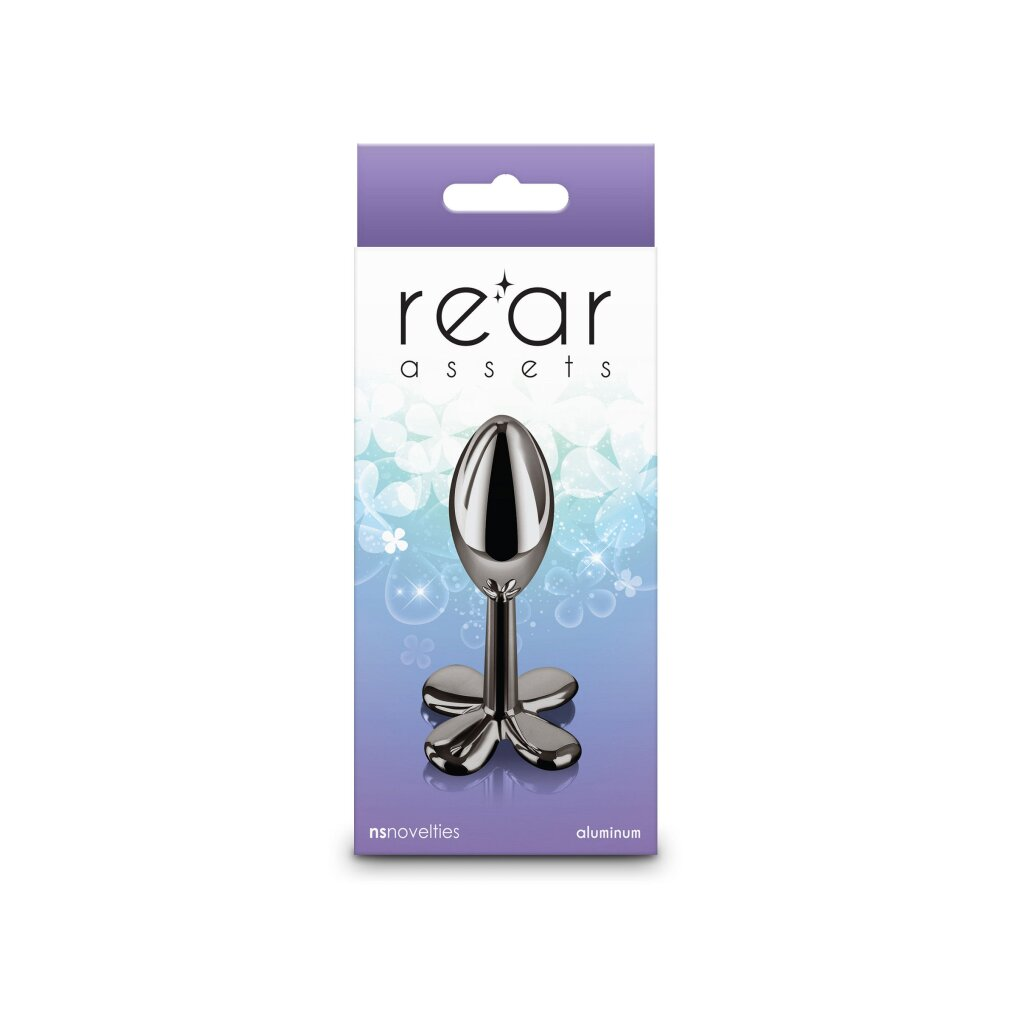 Verpackung von Rear Assets mit einem glänzenden Metallspielzeug auf blauem Hintergrund mit Blumenmuster.