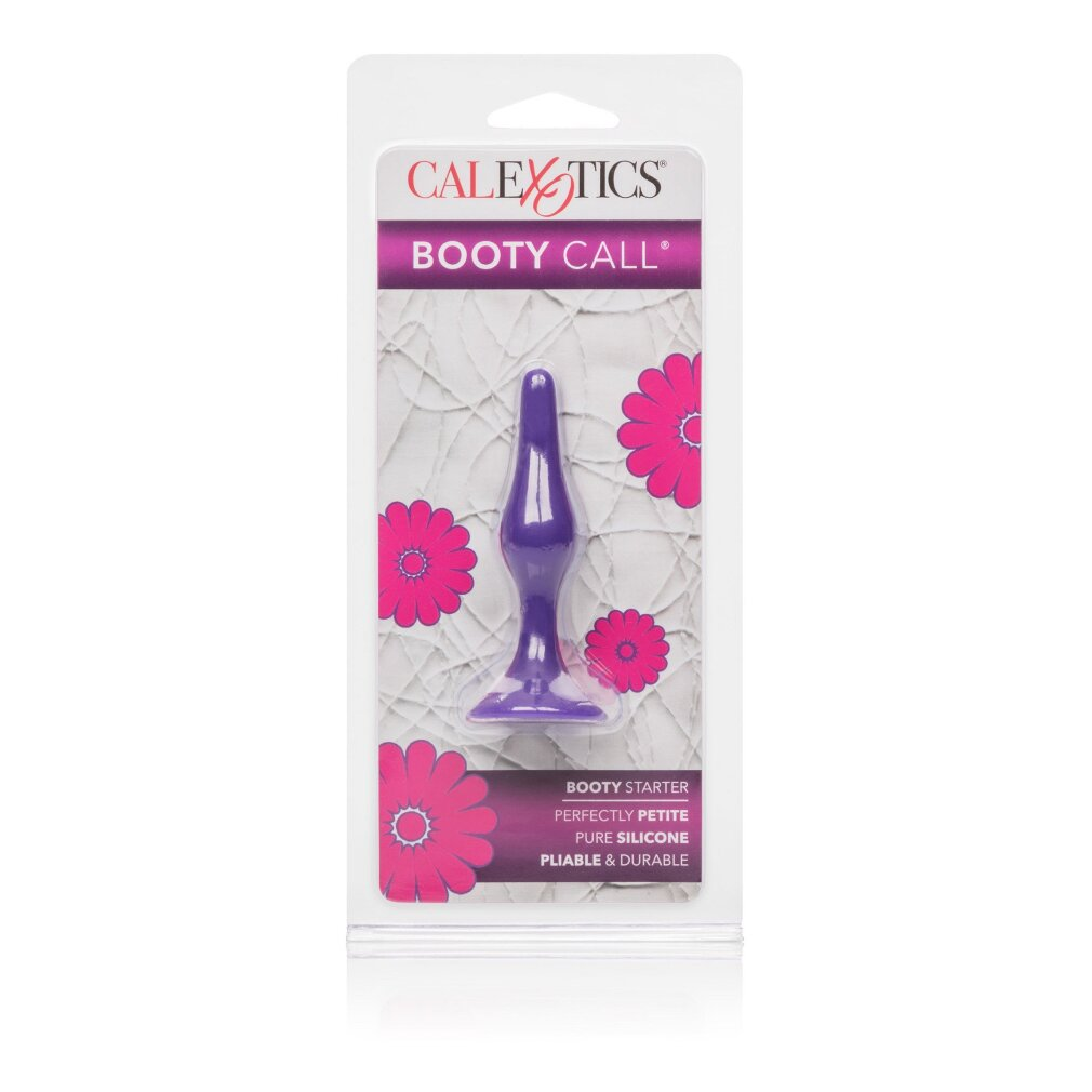 Eine lila Silikon-Analpeitsche in der Originalverpackung mit pinken Blumenmustern.