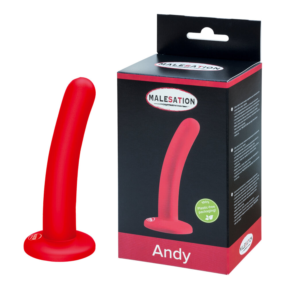 Ein roter Silikon-Anaplug neben seiner Verpackung mit der Aufschrift Malesation Andy.